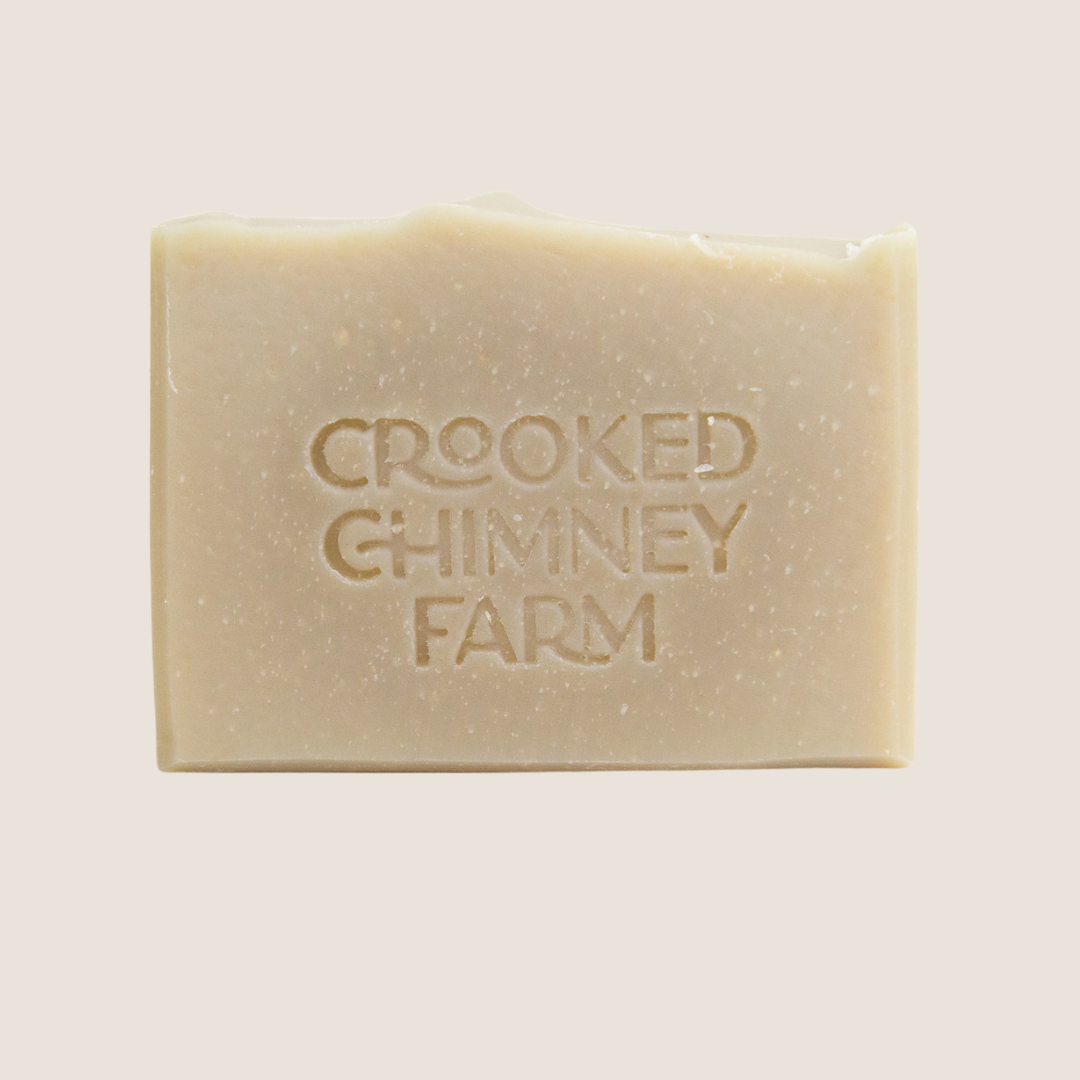 a bar of Field Goat milk soap against a white background