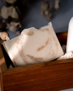 a bar of sea salt and kelp soap in a wooden box
