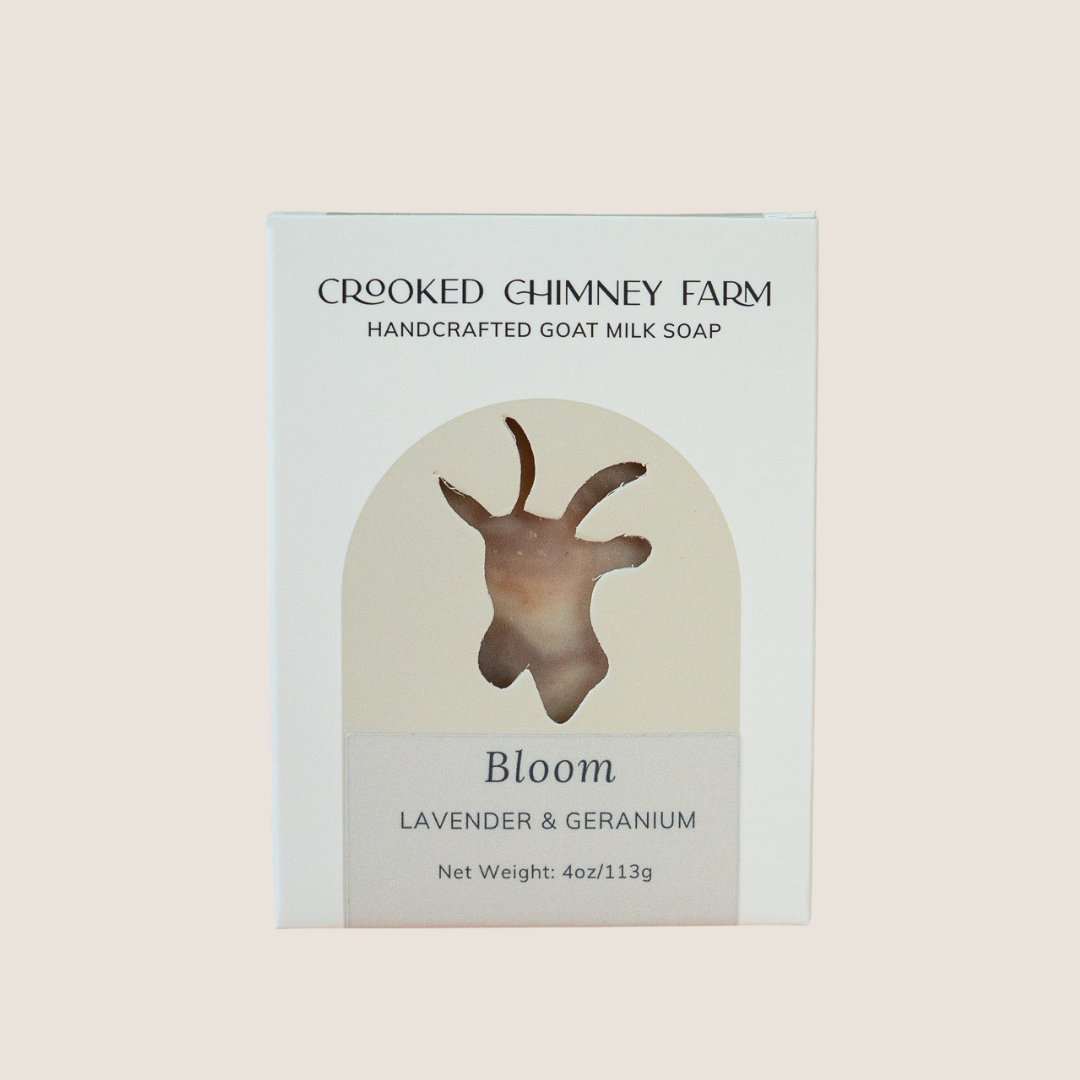 Handcrafted goat milk soap packaging with &