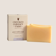 Load image into Gallery viewer, a box next to a bar of naked goat milk soap by crooked chimney farm
