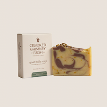 Load image into Gallery viewer, Herb Garden soap bar next to soap box, beige background
