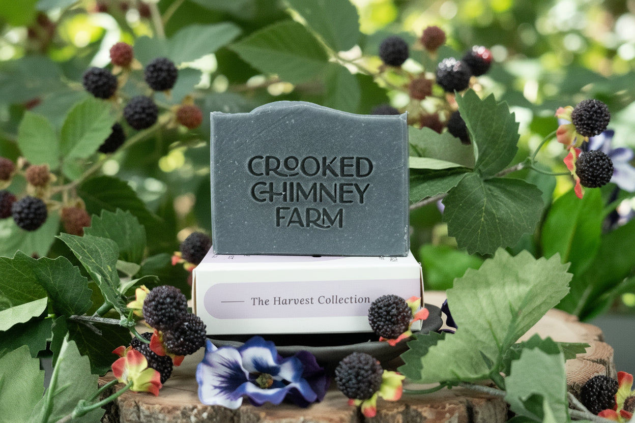 A rectangular bar of soap from Crooked Chimney Farm sits on top of a white box labeled &