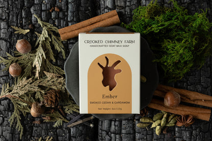 ember soap in packaging on charred log
