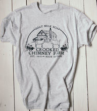 Load image into Gallery viewer, Heathered white tee shirt with Crooked Chimney Farm logo on the front center. Logo has 2 goats and a barn. 
