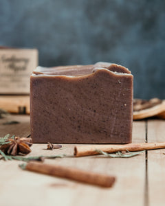 Frankincense and myrrh goat milk soap, brown soap, side view. 